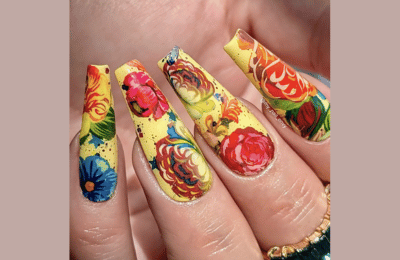 long yellow nais with red and blue flowers accents