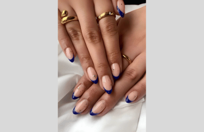 40 Navy Blue Nail Designs to Elevate Your Style 2025 13 Navy blue French nail with gold tiny stars