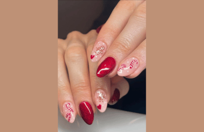 Beautiful red velvet nails iwth gingerbread and candy can designs