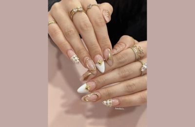 Classic goledn glam spring nail designs with white accents