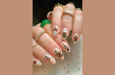 Neutral nails with gingerbread, holly berries, and christmas art