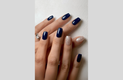 40 Navy Blue Nail Designs to Elevate Your Style 2025 25 Navy blue nail with glitter accent