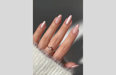 Light pink nail with pearl swril nail designs