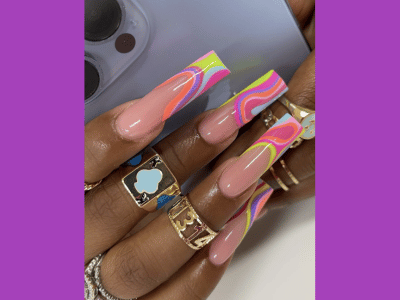 Vibrant French tip nail designs, May nail ideas with bold hues.