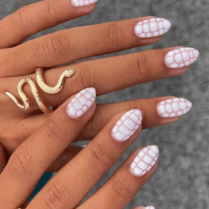 White crocodile print summer nails with a bold textured look