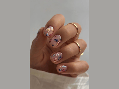 50 Stunning Short Spring Nail Designs Trending in 2025 19 Nails decorated with colorful flowers, celebrating the season.