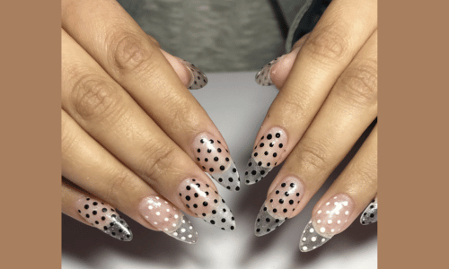 25 Must Try Polka Dot Nail Designs for a Stylish Look 3 Classic black and white polka dot nail art for a timeless style.