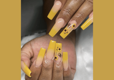 25 Sunflower Nail Designs in Yellow Shades for Summer 22 Long ombre nails with sunflower design for eye-catching art