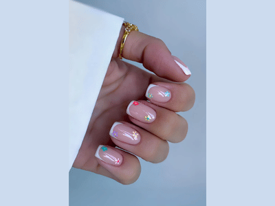 50 Stunning Short Spring Nail Designs Trending in 2025 22 Beautiful nails with floral French design, artistic and elegant.