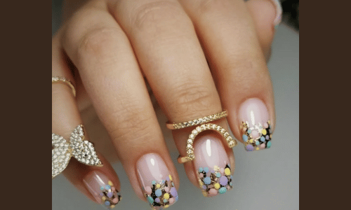 25 Must Try Polka Dot Nail Designs for a Stylish Look 23 Sparkling pastel polka dot nail art, adding a glamorous touch to your look