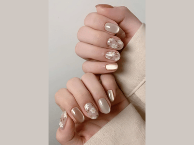 50 Stunning Short Spring Nail Designs Trending in 2025 28 Gold cat eye nail design with brown flowers