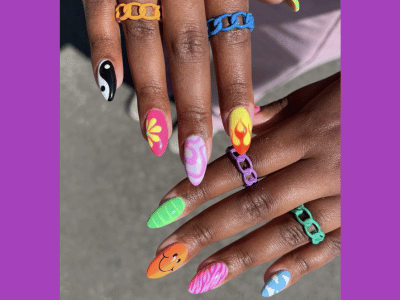 Playful spring-themed nail art featuring florals and stripes