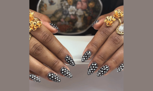 25 Must Try Polka Dot Nail Designs for a Stylish Look 4 Simple polka dot nails with a black and white design for an effortless charm.