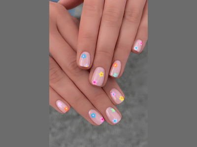50 Stunning Short Spring Nail Designs Trending in 2025 33 Short pink nails with tiny colorful flower designs