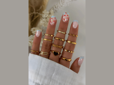 50 Stunning Short Spring Nail Designs Trending in 2025 37 Short spring nails with blue french art and tiny cherries