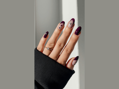 50 Stunning Short Spring Nail Designs Trending in 2025 40 Dark purple nails with stars