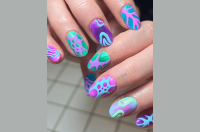 Radiant aura vacation nails in pink, orange, and yellow hues