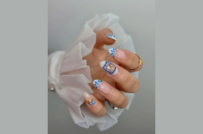 Elegant nude vacation nails with soft pink and white designs