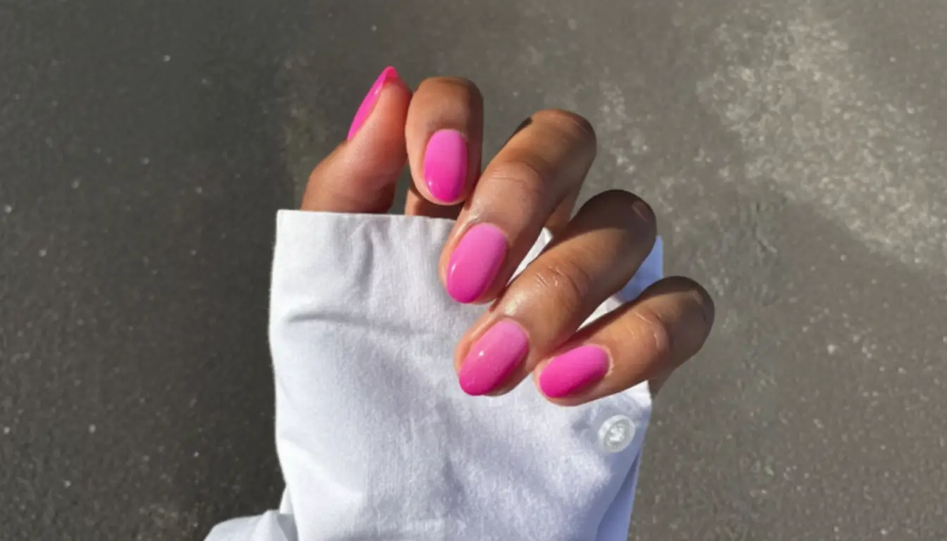 Two-tone pink cat eye nails with bold Barbie-inspired shine.