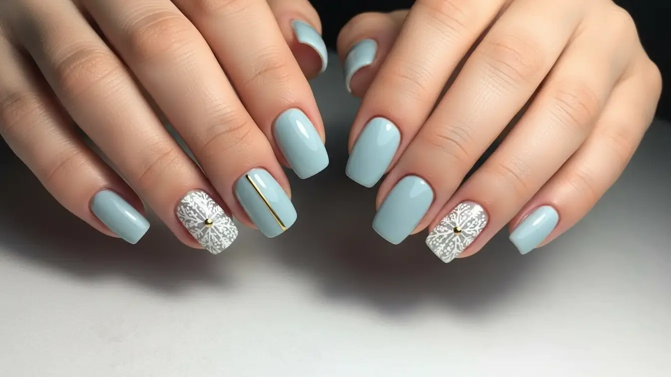 Pearl blue Christmas nails with subtle glow, elegant blue Christmas nail designs for a classy holiday look.
