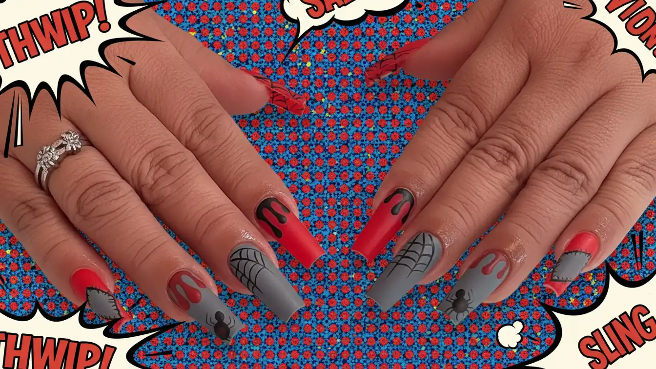 Cartoon-style spider webs in red and black - fun Halloween spider nail designs.